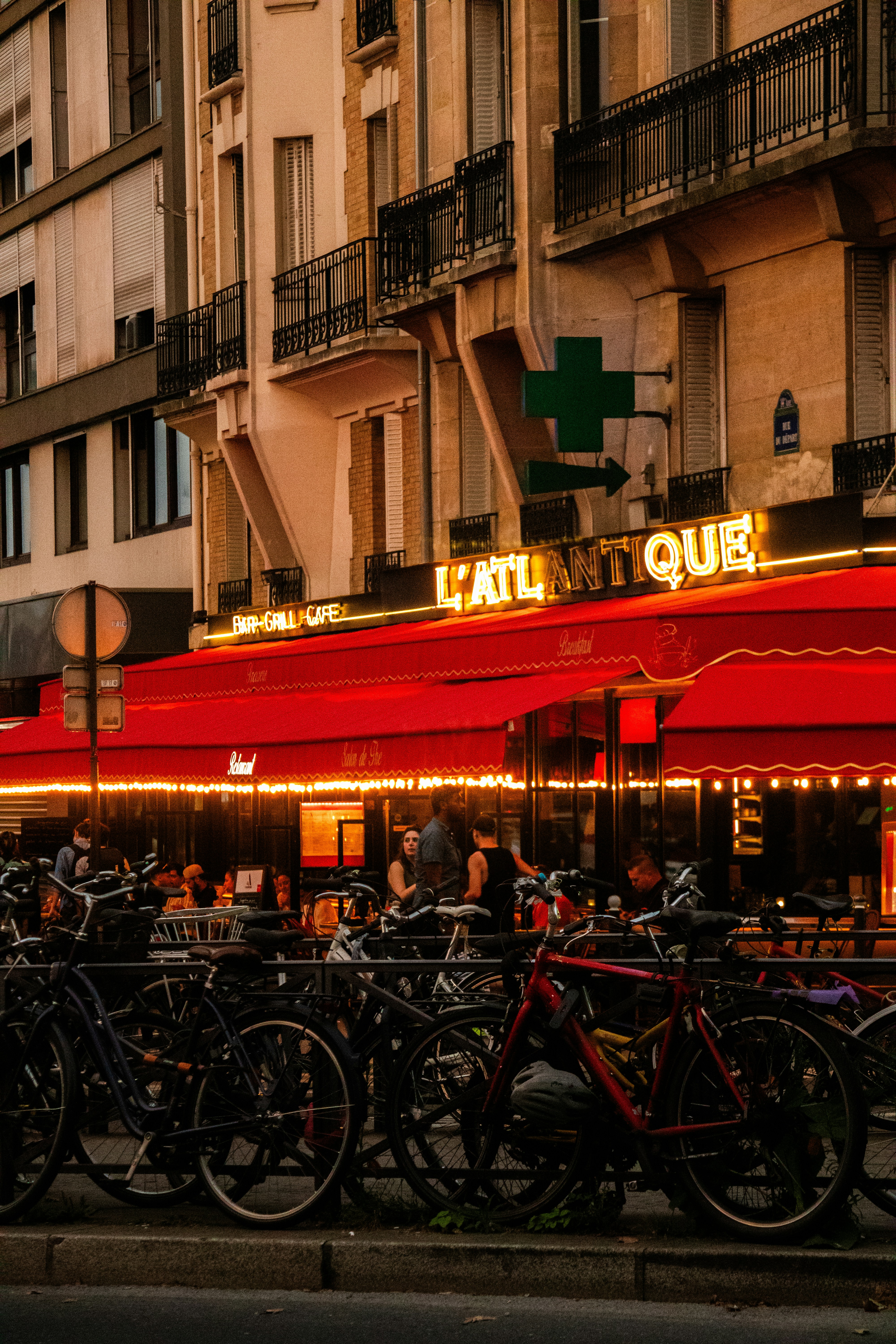 A group of bikes parked in front of a restaurant