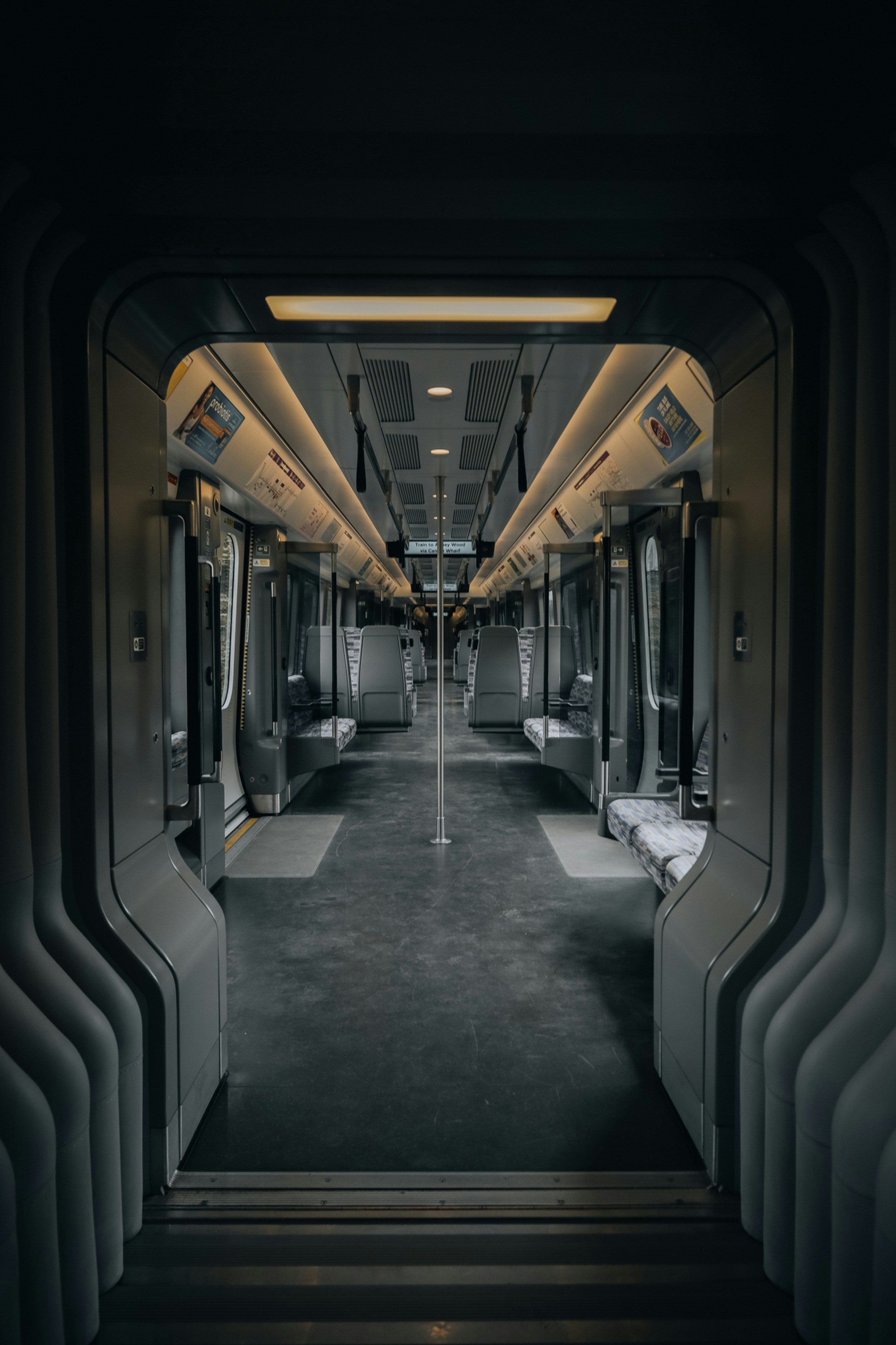 An empty train car with stairs leading up to it