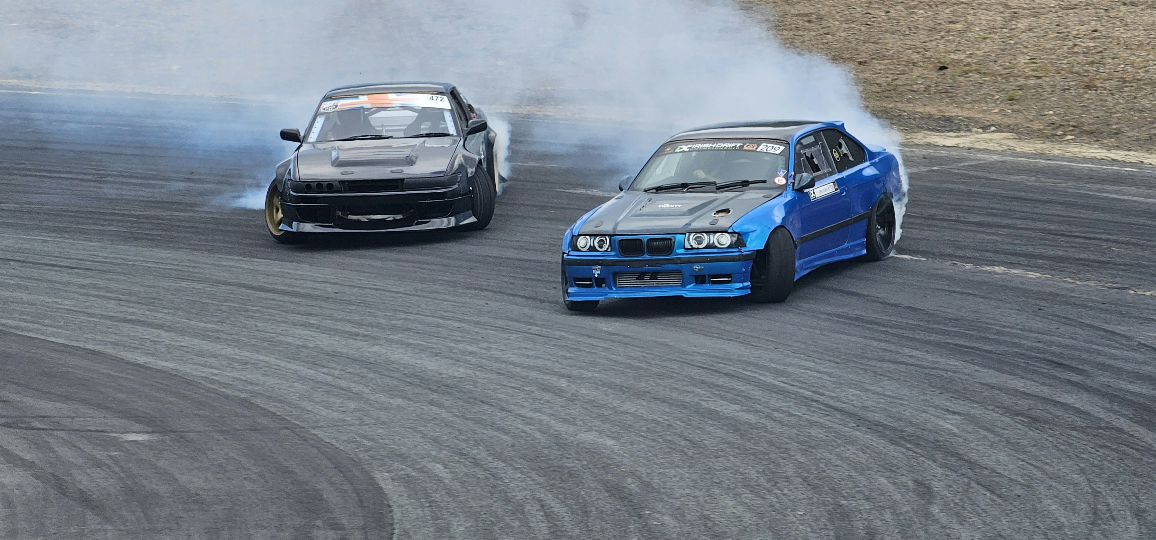 A couple of cars that are on a track