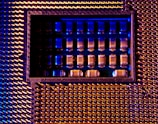 A close up of a metal structure with blue lights
