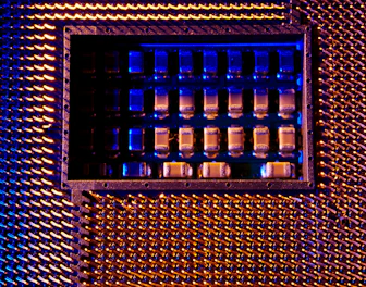 A close up of a metal structure with blue lights