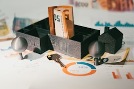 A couple of keys are sitting in a holder