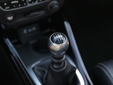 A close up of a gear stick in a car