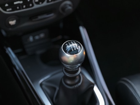 A close up of a gear stick in a car