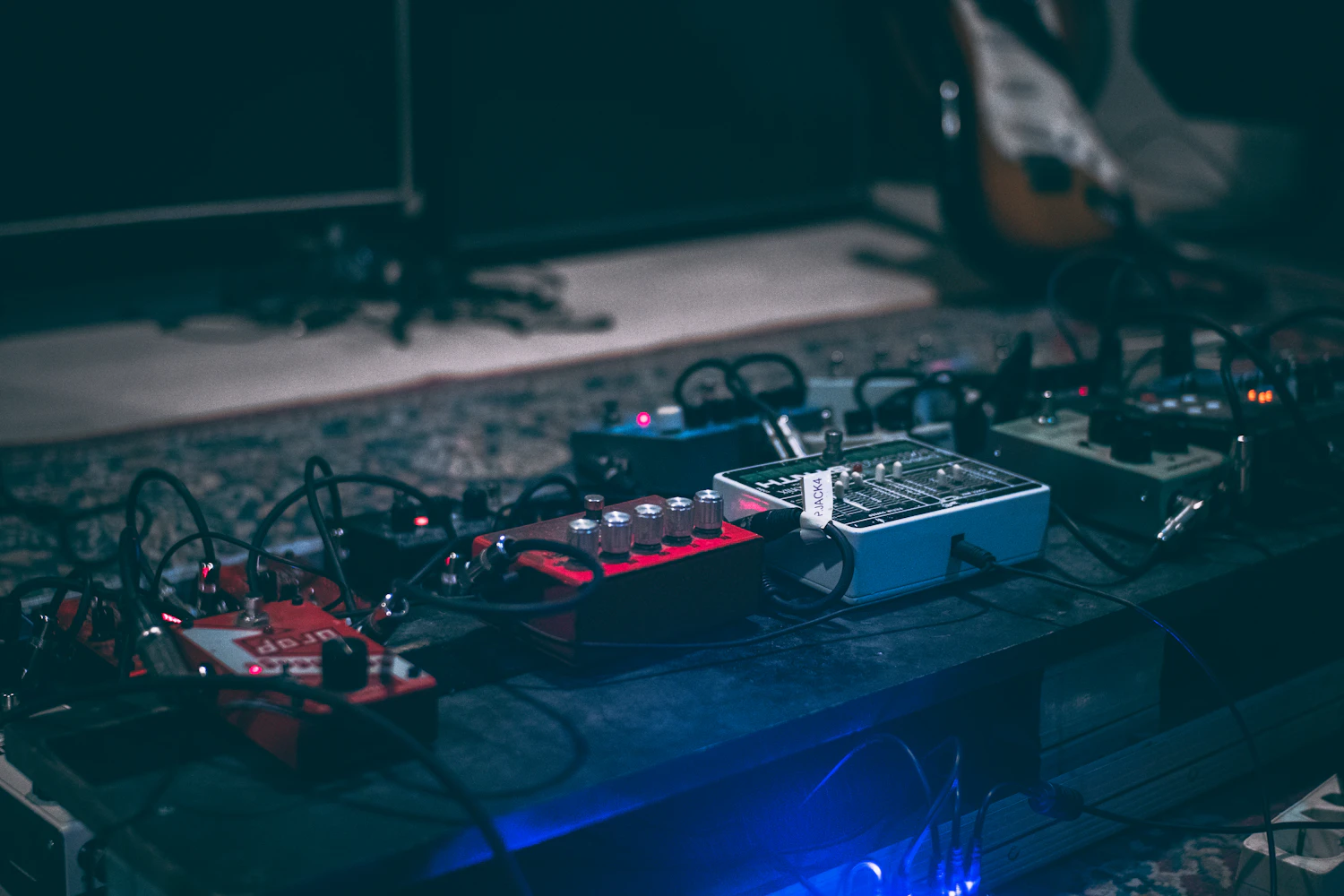 Nightshift Chorus pedal lit blue on the test bench, in stock