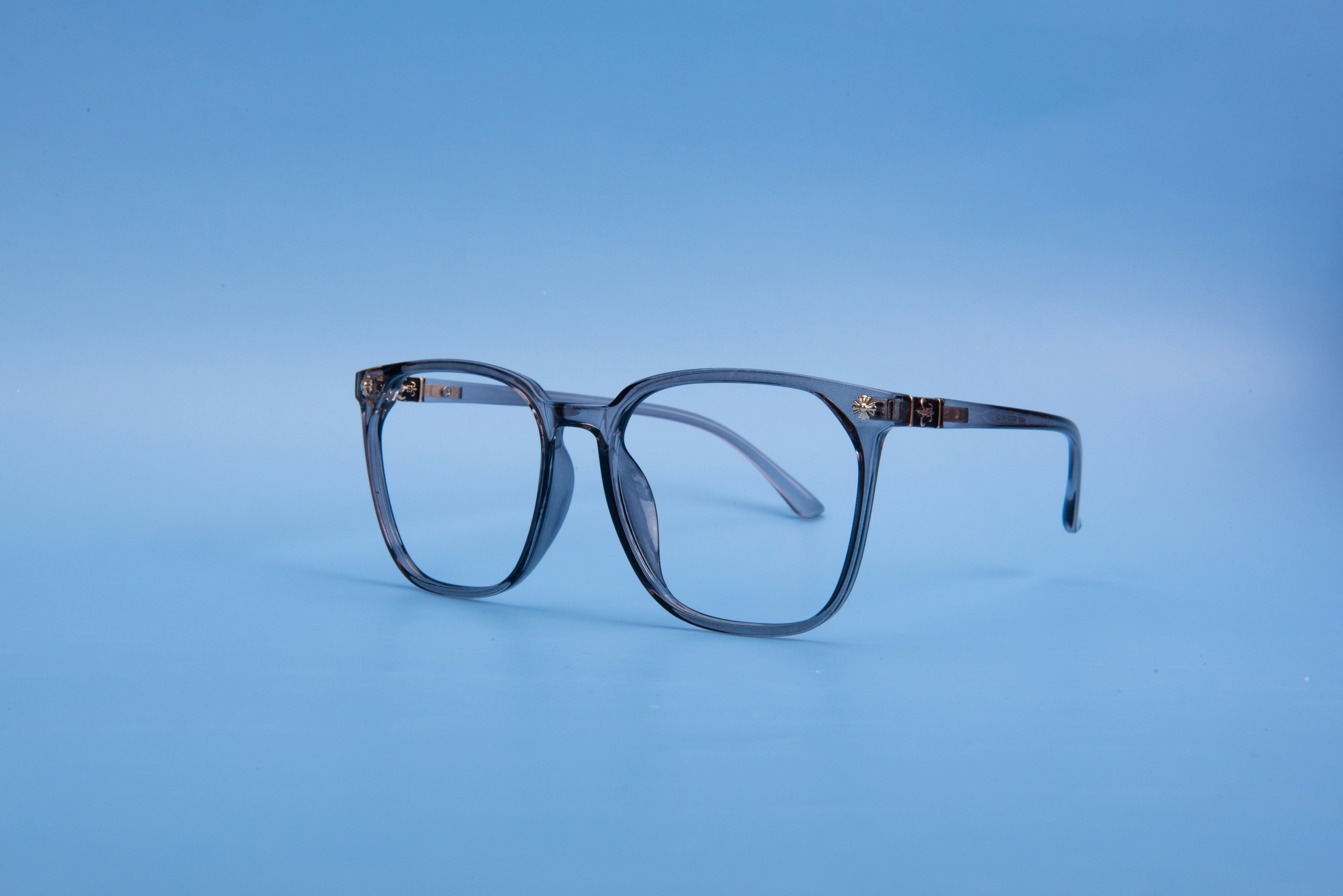 A pair of glasses on a blue background