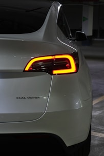 A close up of the tail lights of a car
