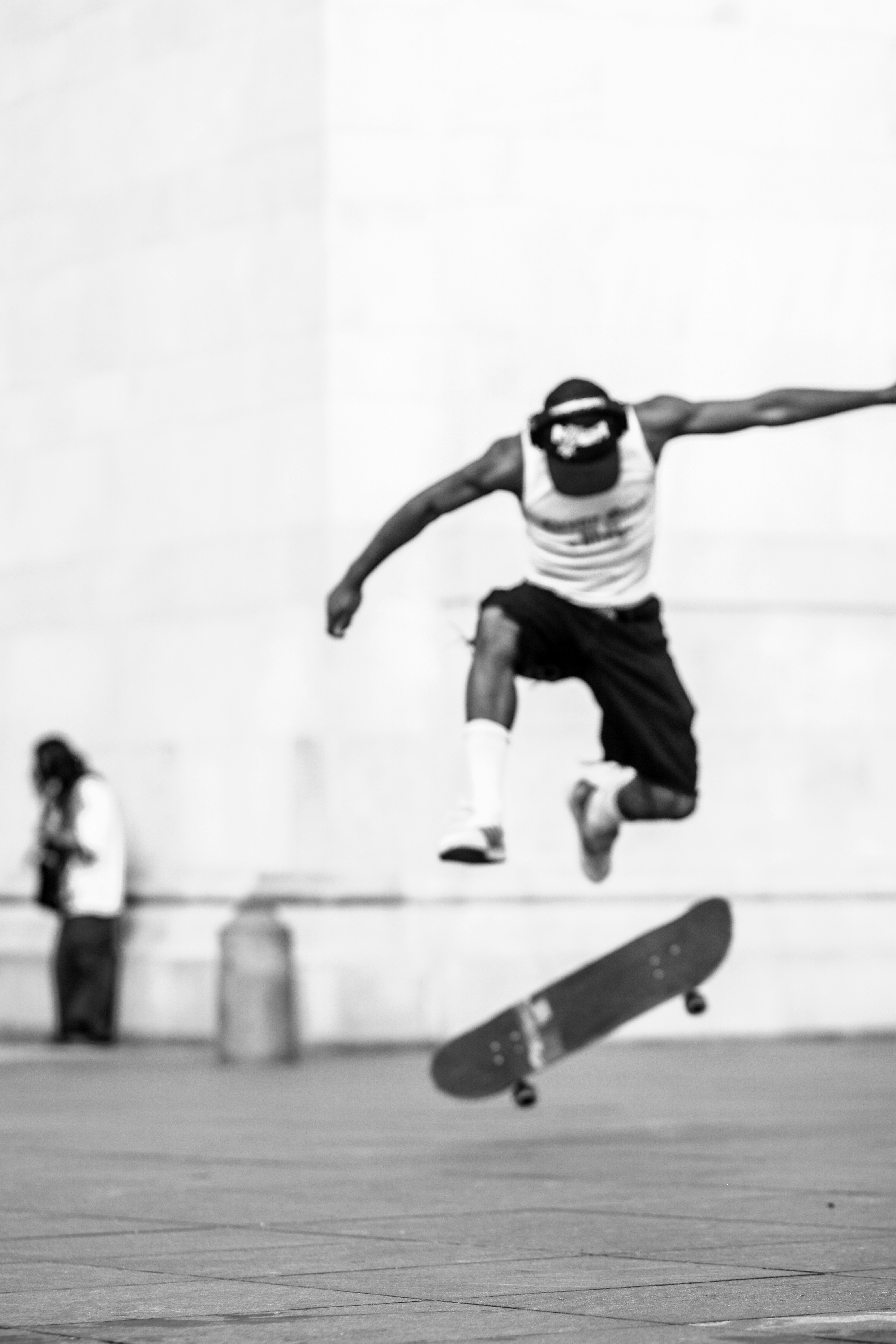 A man flying through the air while riding a skateboard