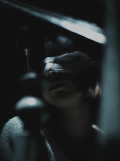 A blurry photo of a person holding a knife