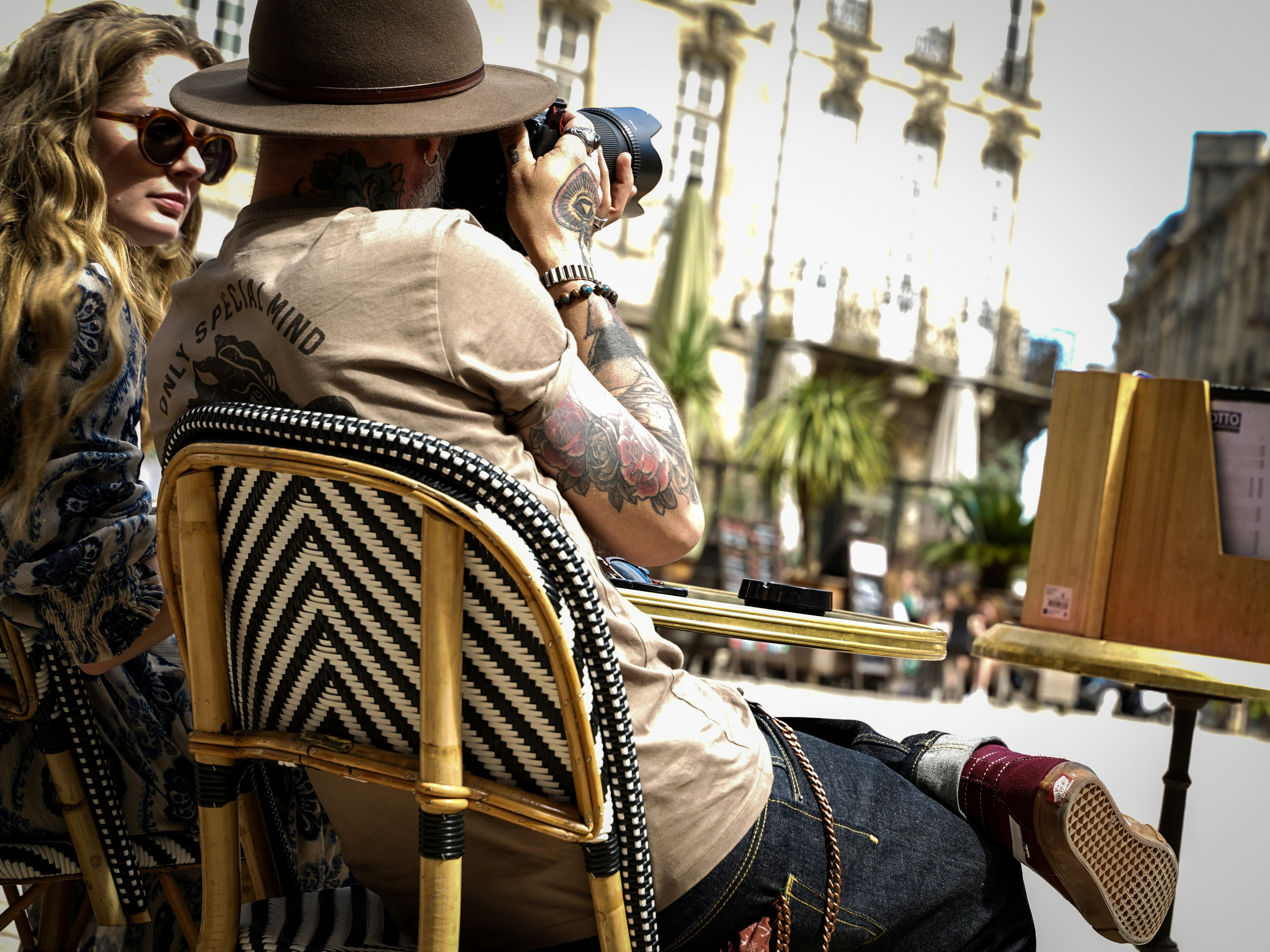 A man and a woman sitting in a chair
