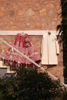 A red and white dress hanging on a clothes line