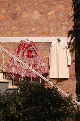 A red and white dress hanging on a clothes line