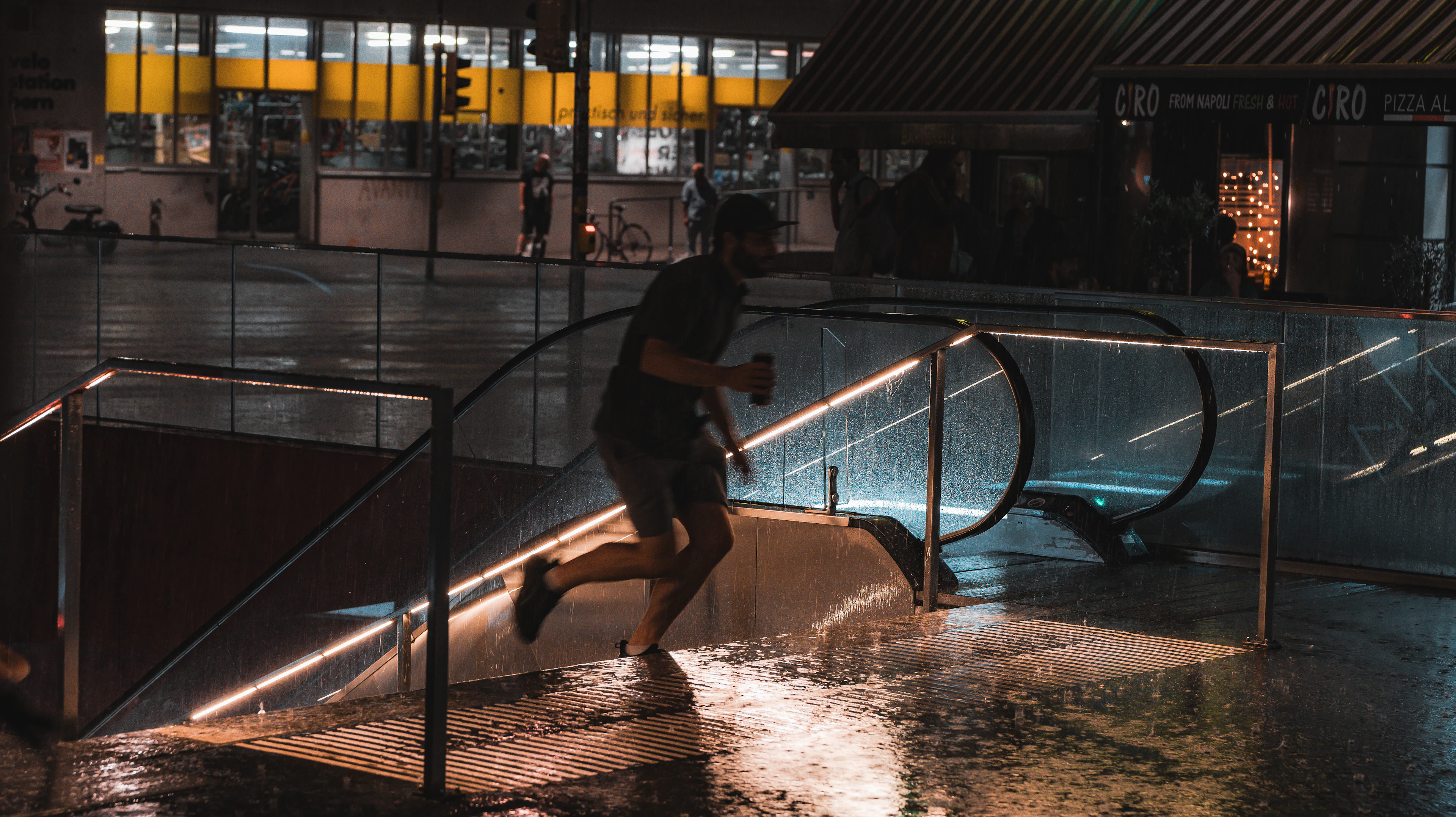 Wet cobblestones and arcades in Bern on a rainy day