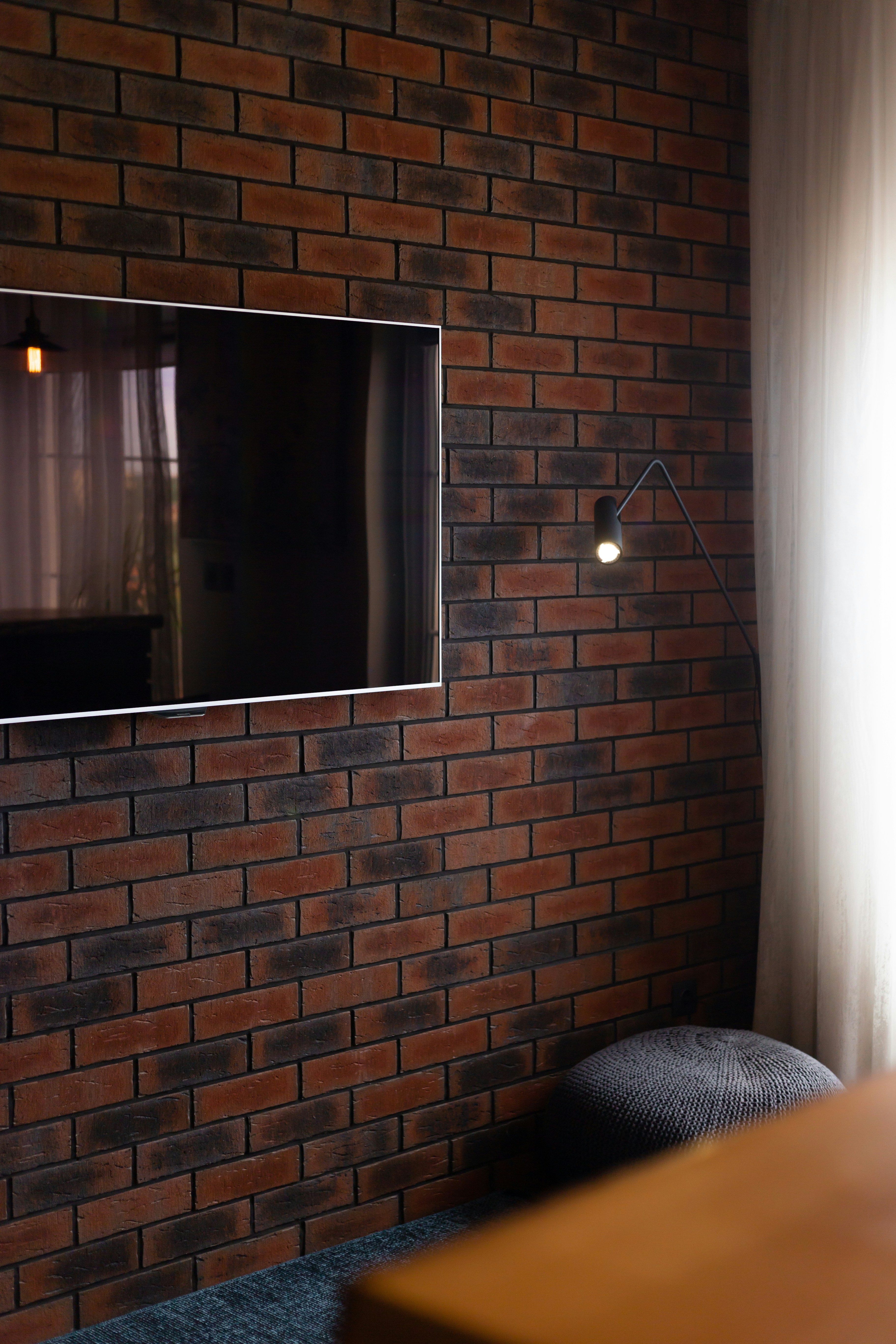 TV mounted on wall with cable management