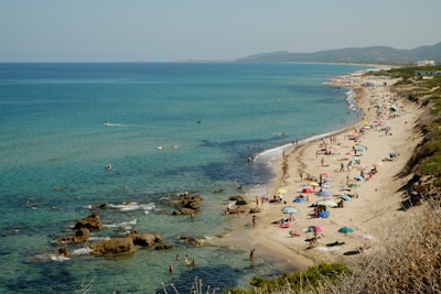 A beach with a lot of people on it