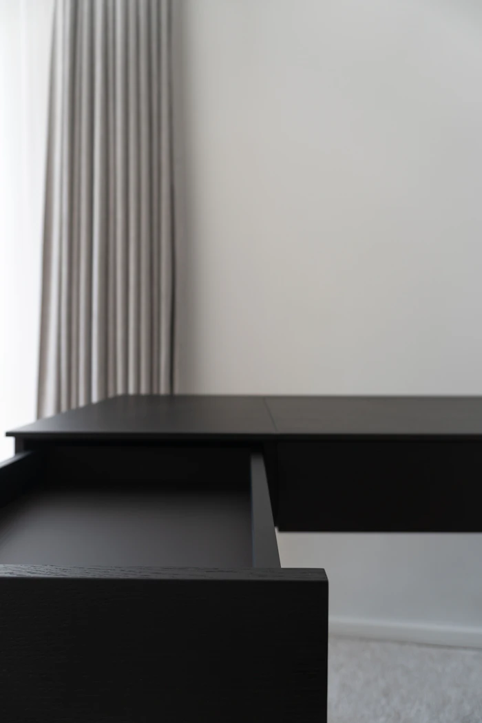 Built in desk under a bright window