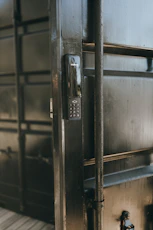 A metal door with a lock on it