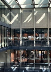 A large building with lots of windows and a skylight