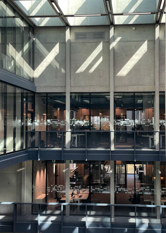 A large building with lots of windows and a skylight