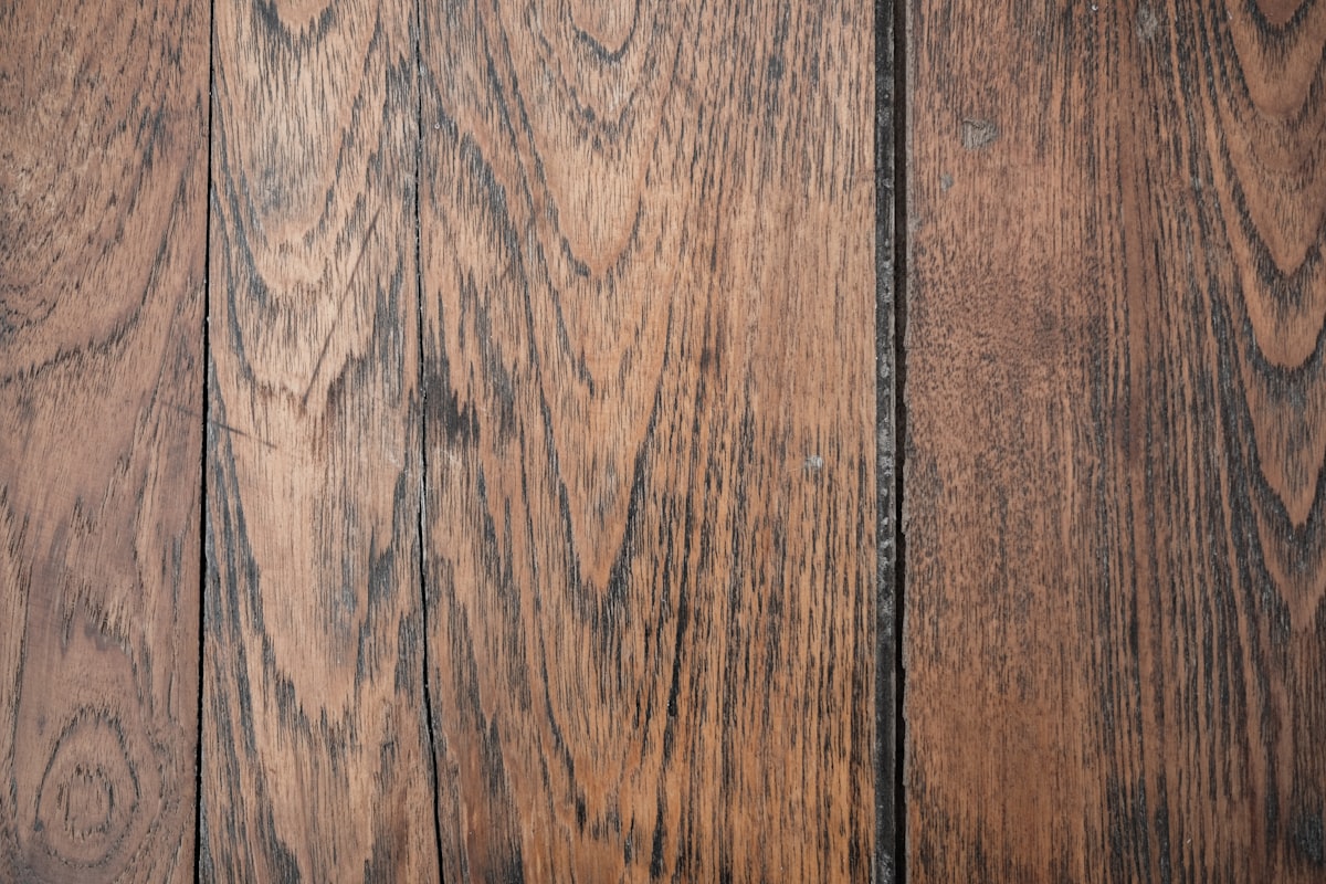 Brushbox timber flooring close-up with warm reddish-brown stained boards