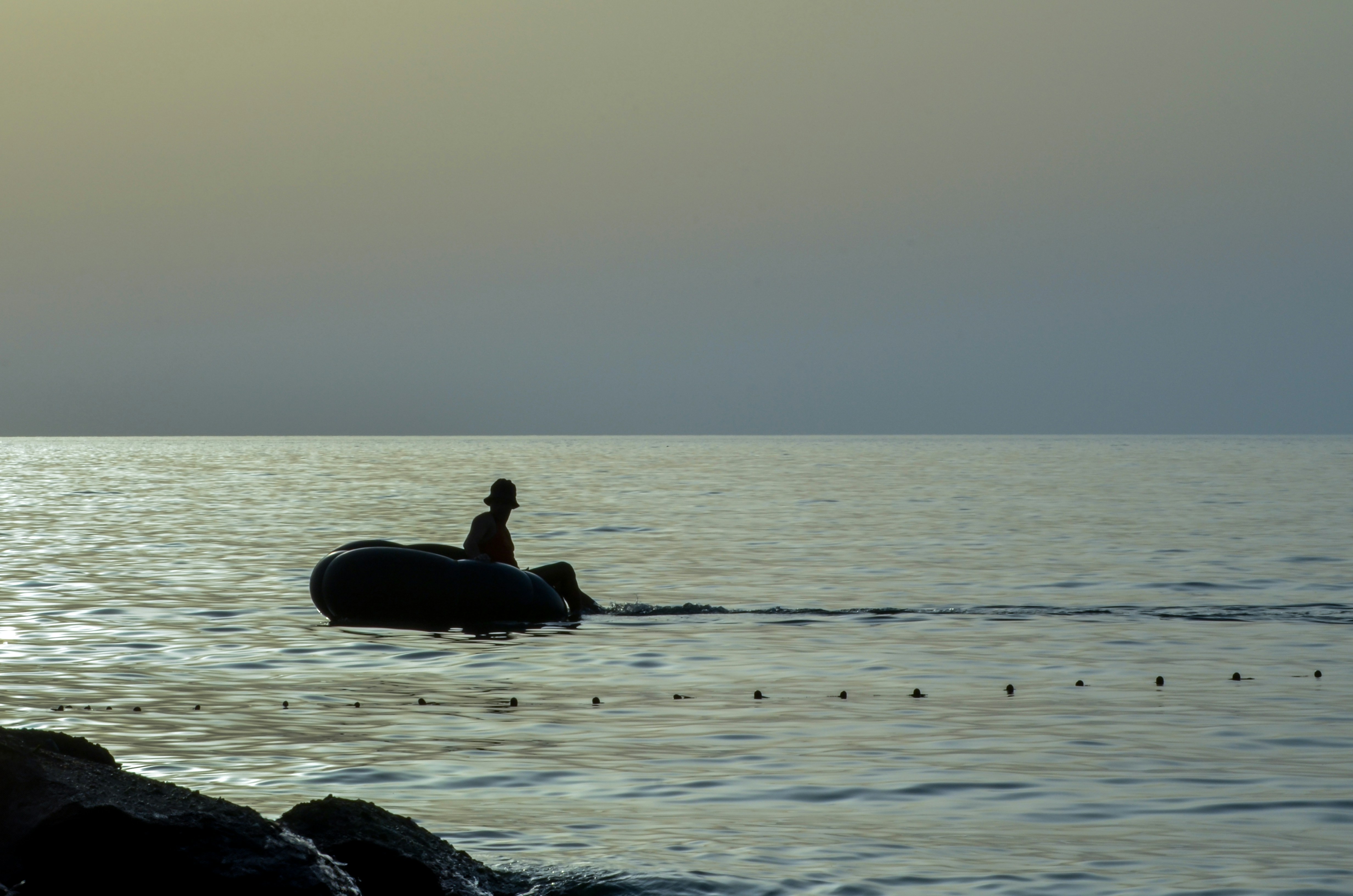 A person on a boat in the water