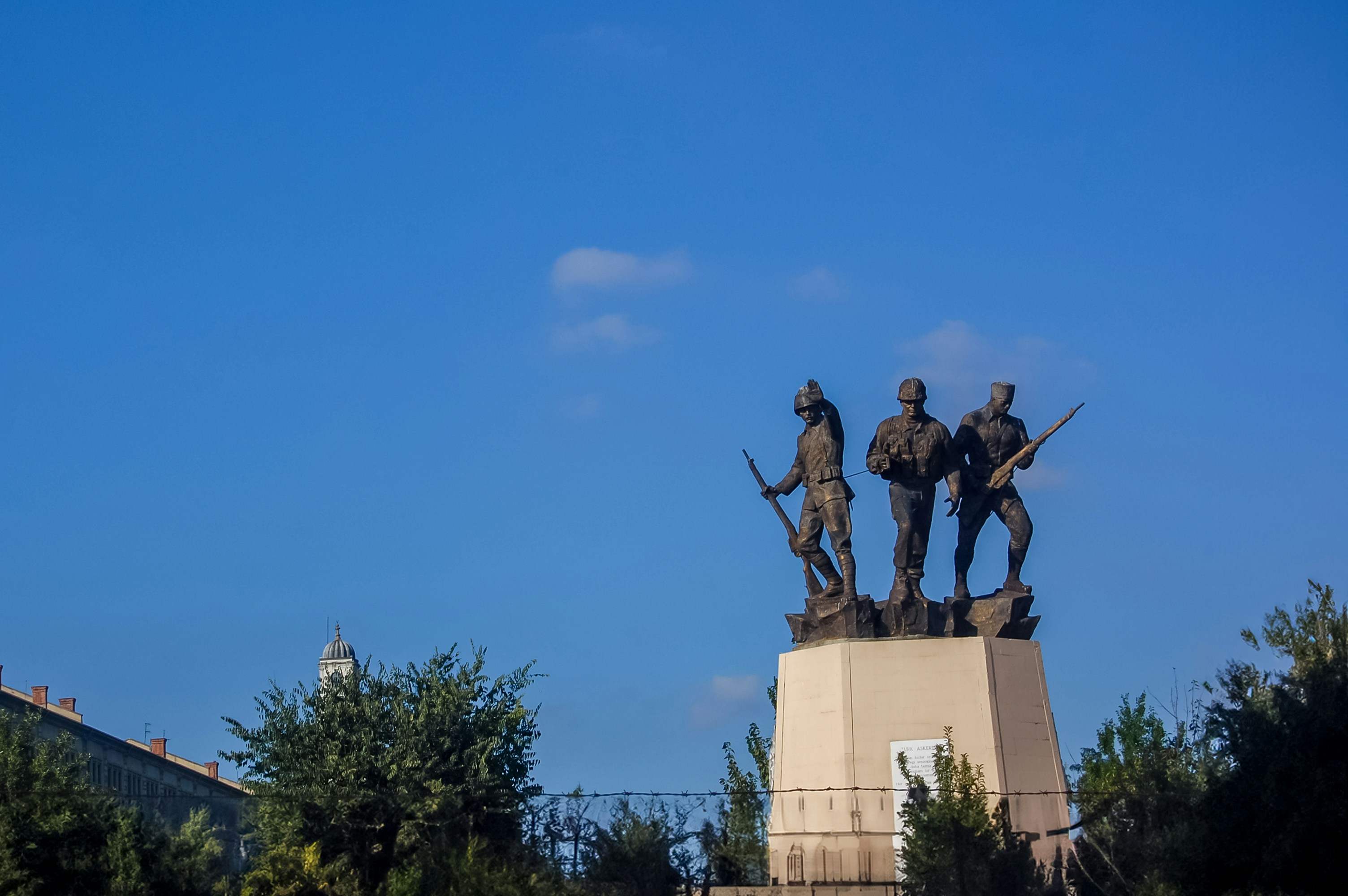 A statue of a group of men with guns