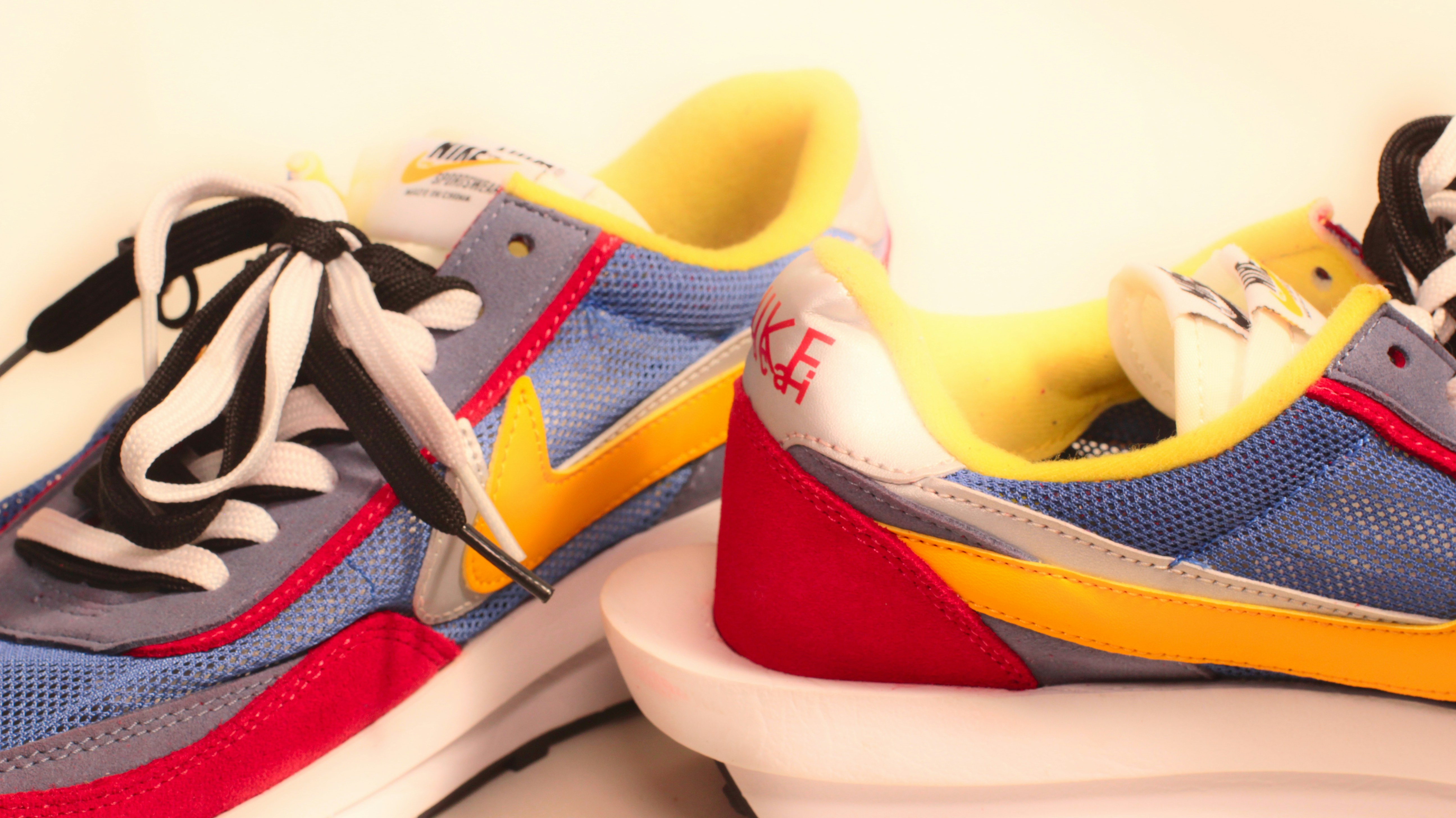 A pair of sneakers with a tie around the toe