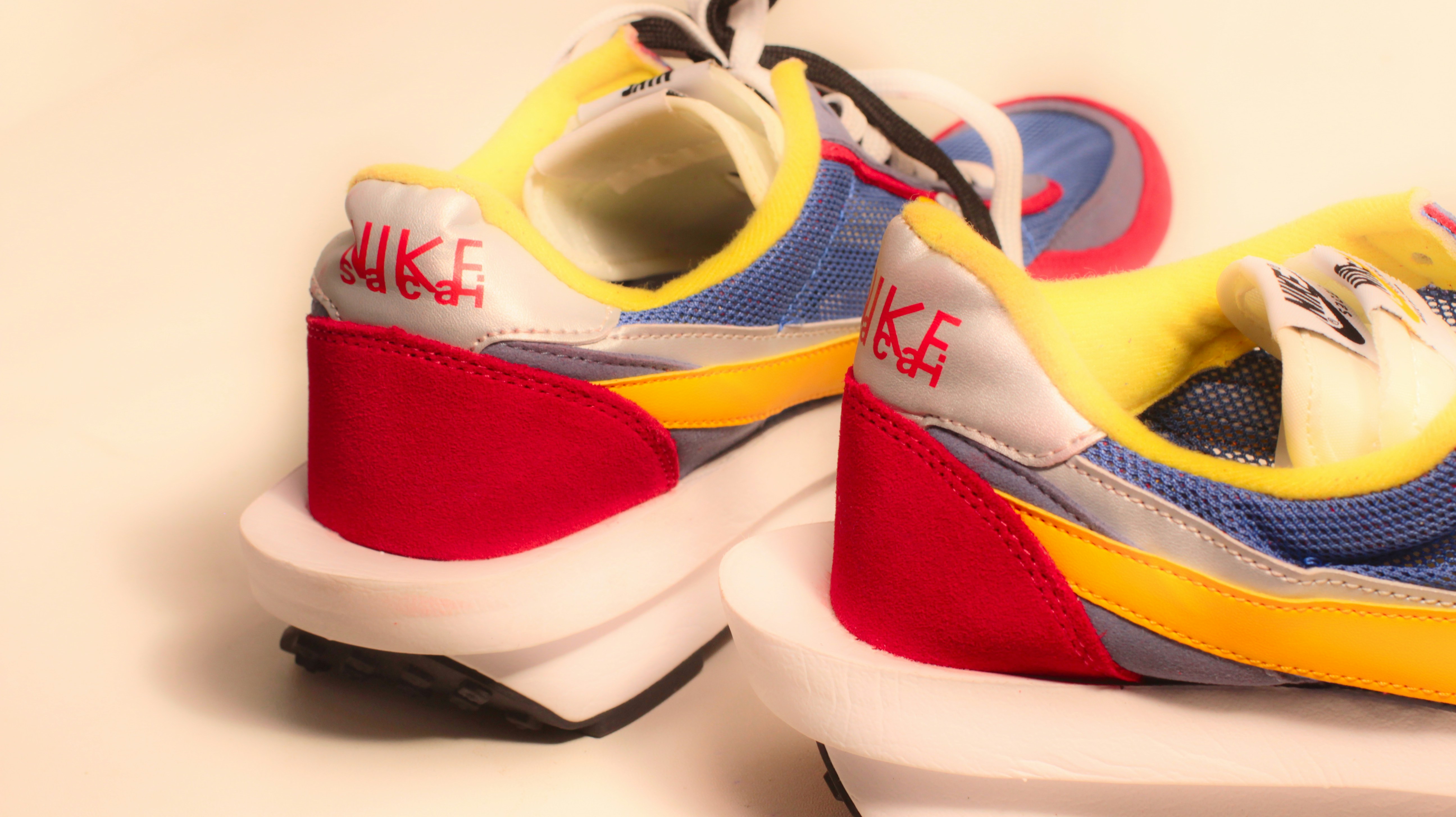 A pair of colorful sneakers with white soles