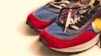 A pair of sneakers with a rubber duck on top of them