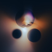 A blurry photo of two balls of light
