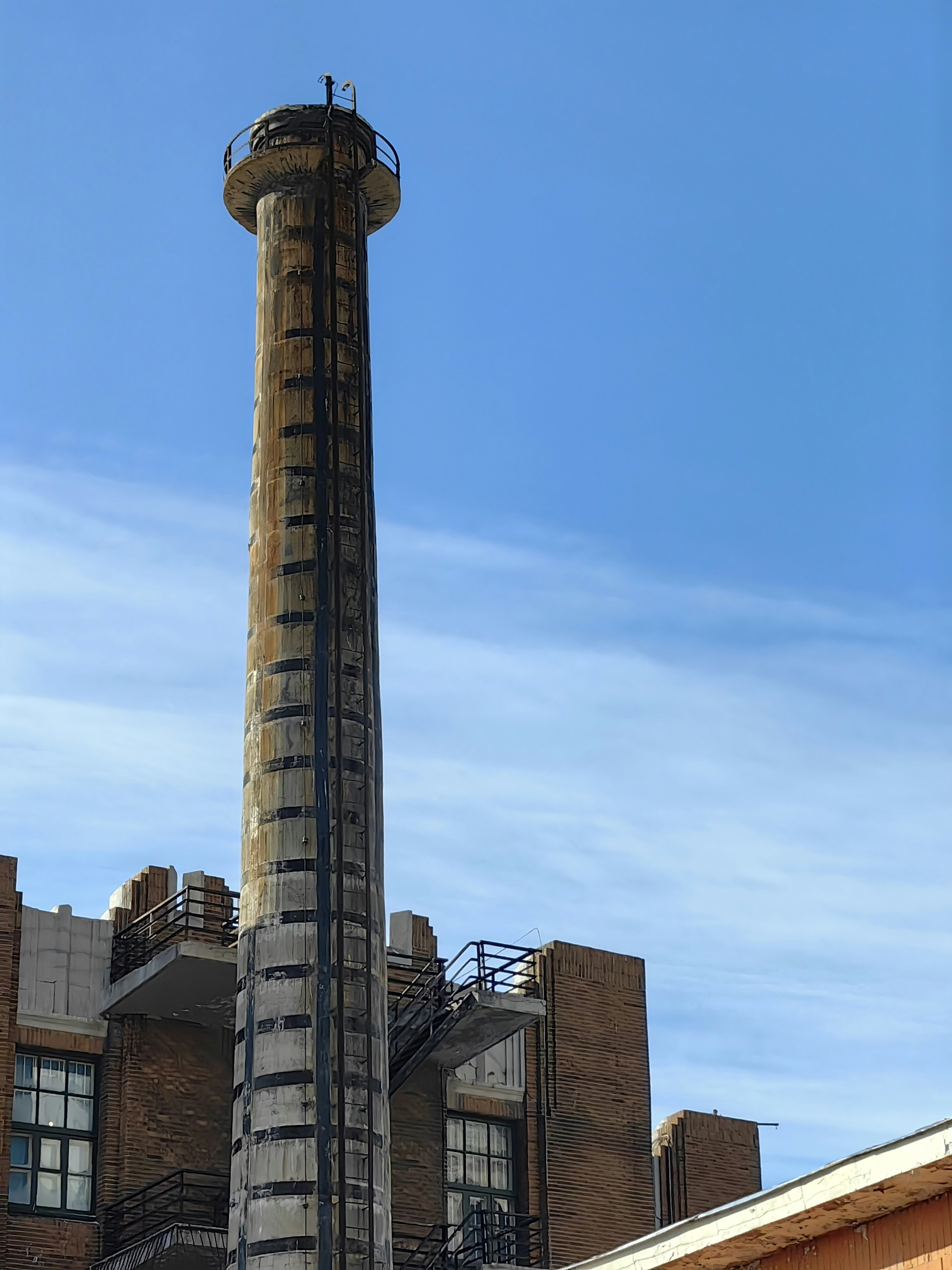 A tall tower with a clock on top of it