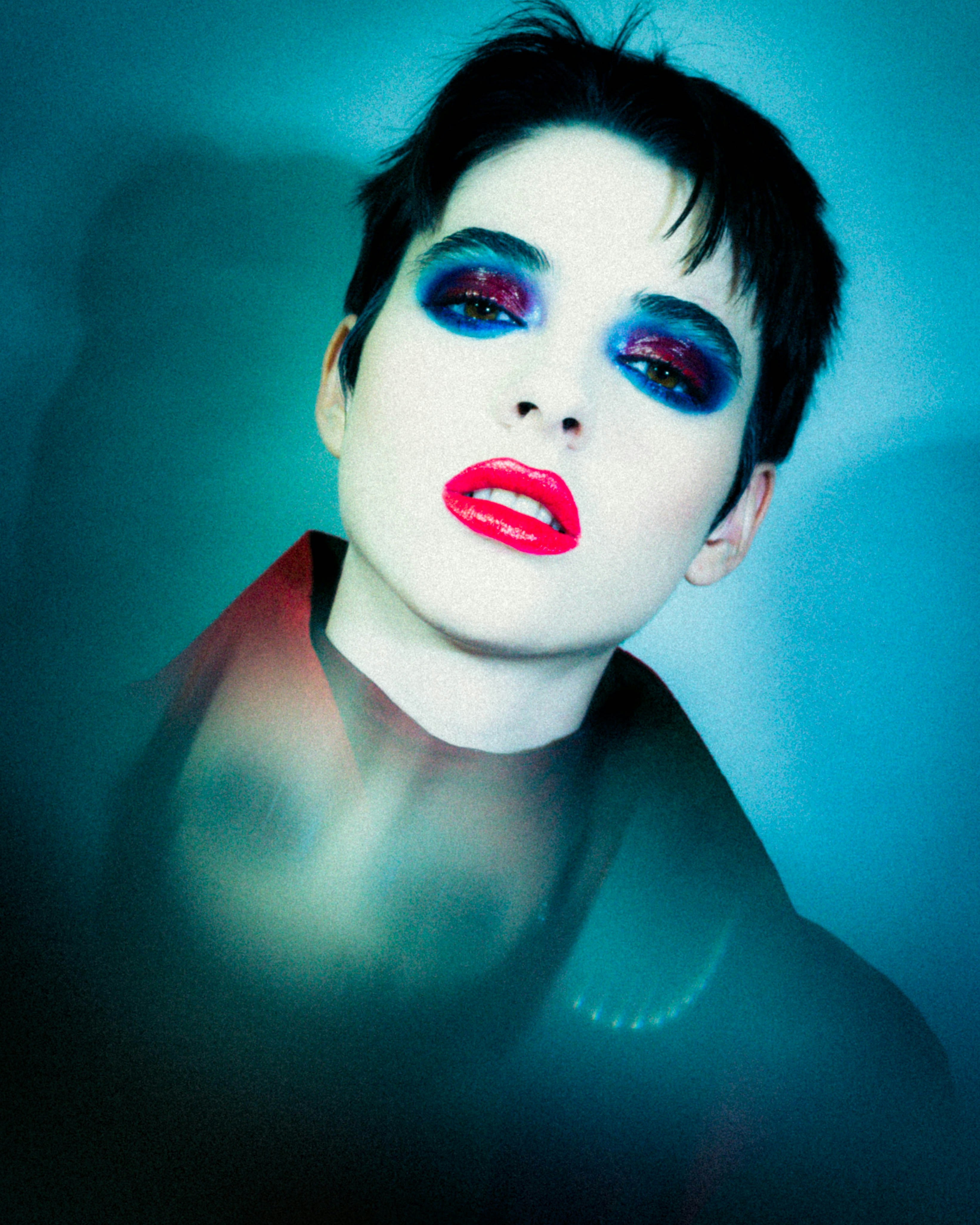 Woman with Blue Eyes and Red Lipstick