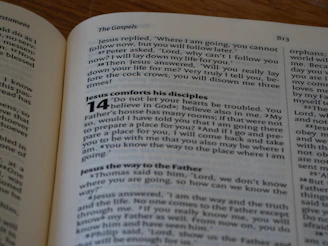 A close up of an open book on a table
