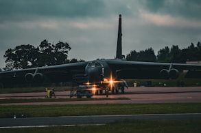 A large jetliner sitting on top of an airport tarmac
