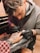 A man getting a tattoo on his arm