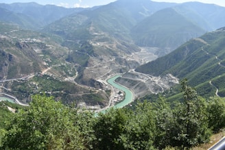 A scenic view of a valley and a river