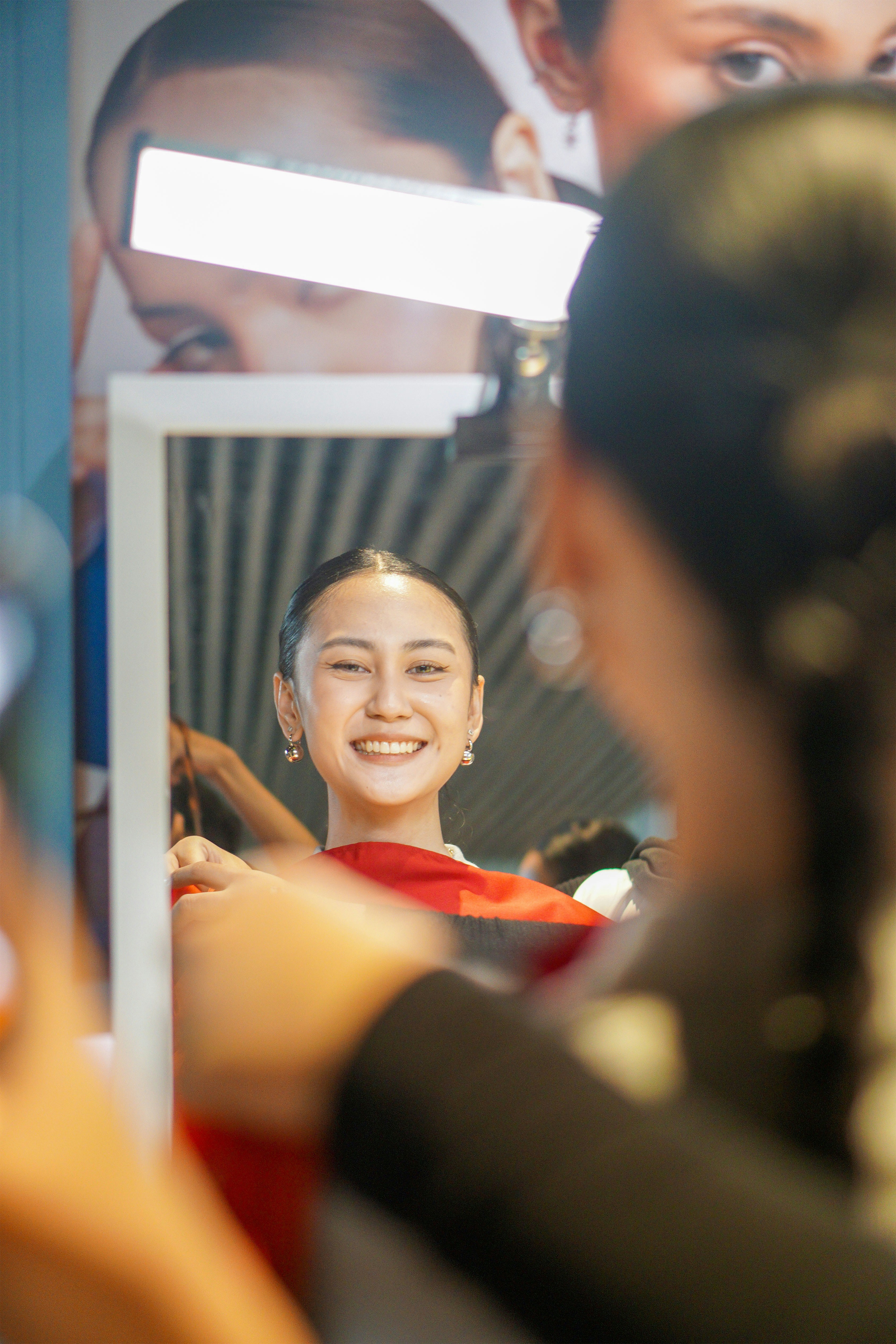 A woman taking a picture of herself in a mirror