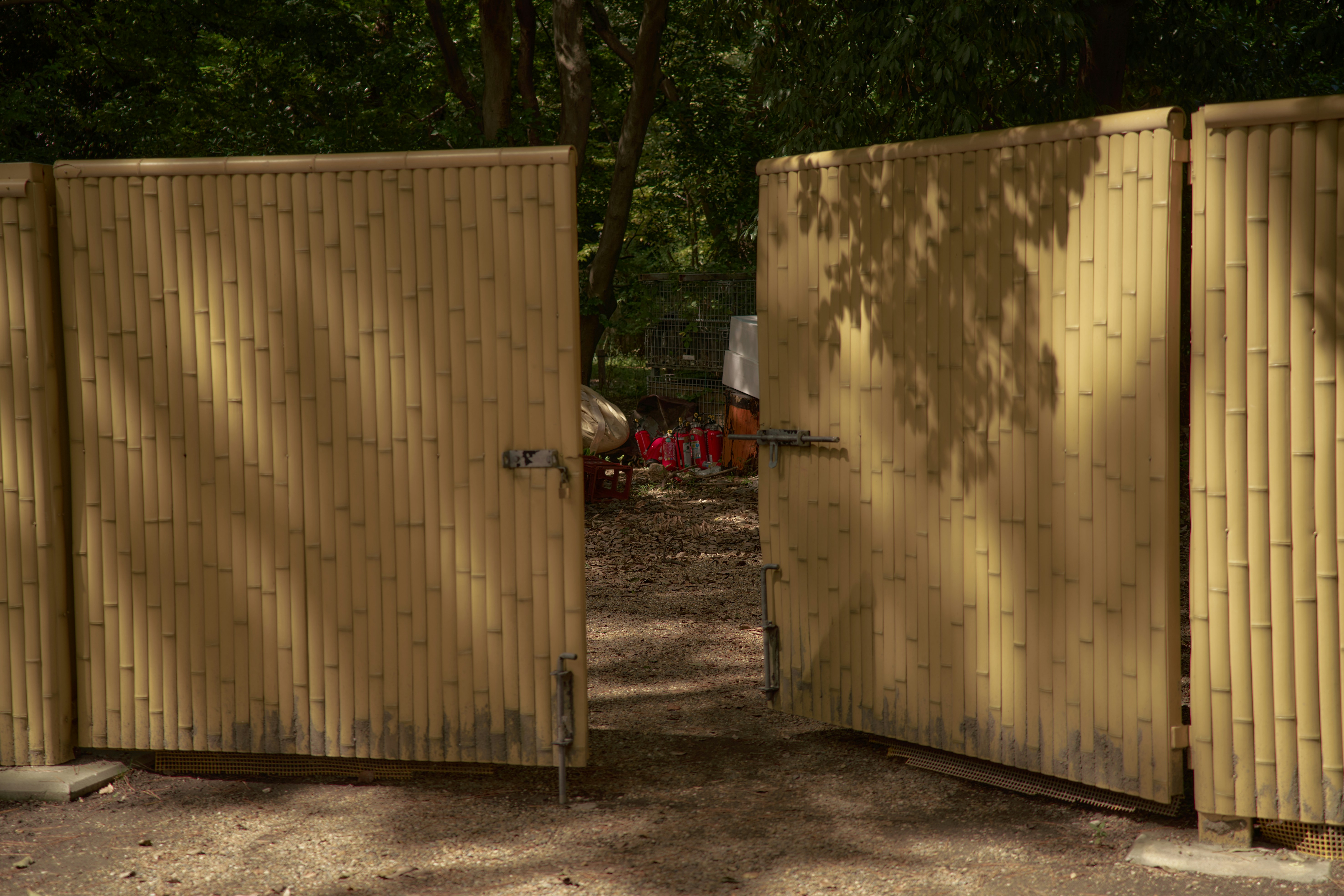 A couple of gates that are next to each other