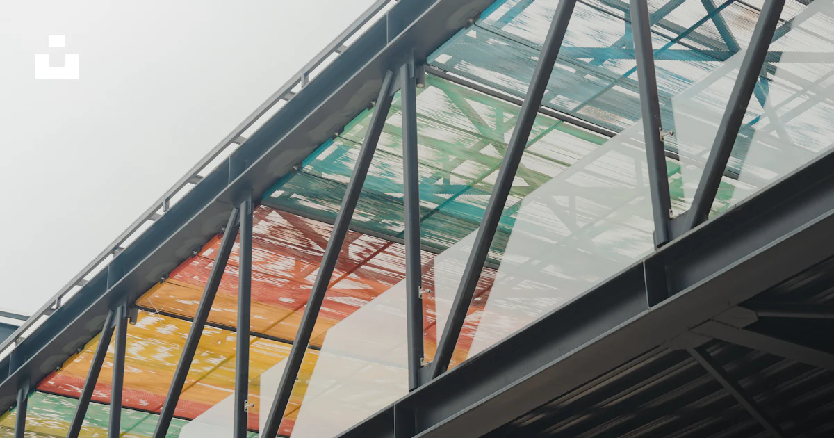 A bridge that has a bunch of different colors on it photo – Free ...