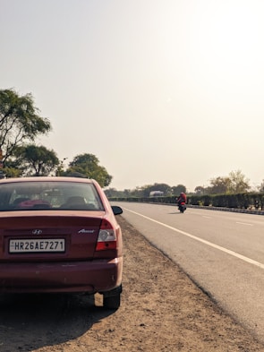 A car is parked on the side of the road