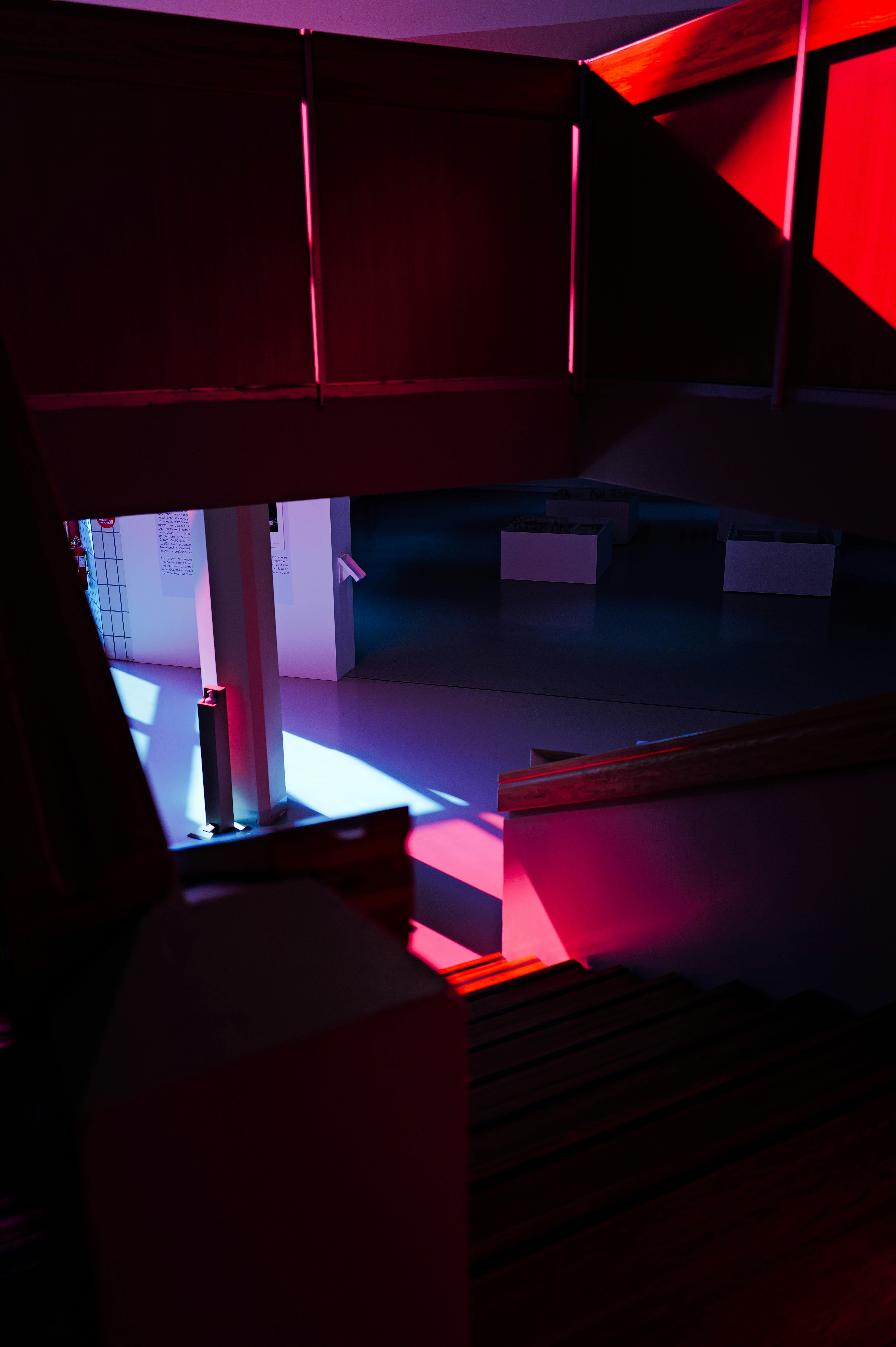 A dark room with red and blue lights