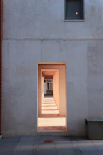 An open door leading to a room with a window