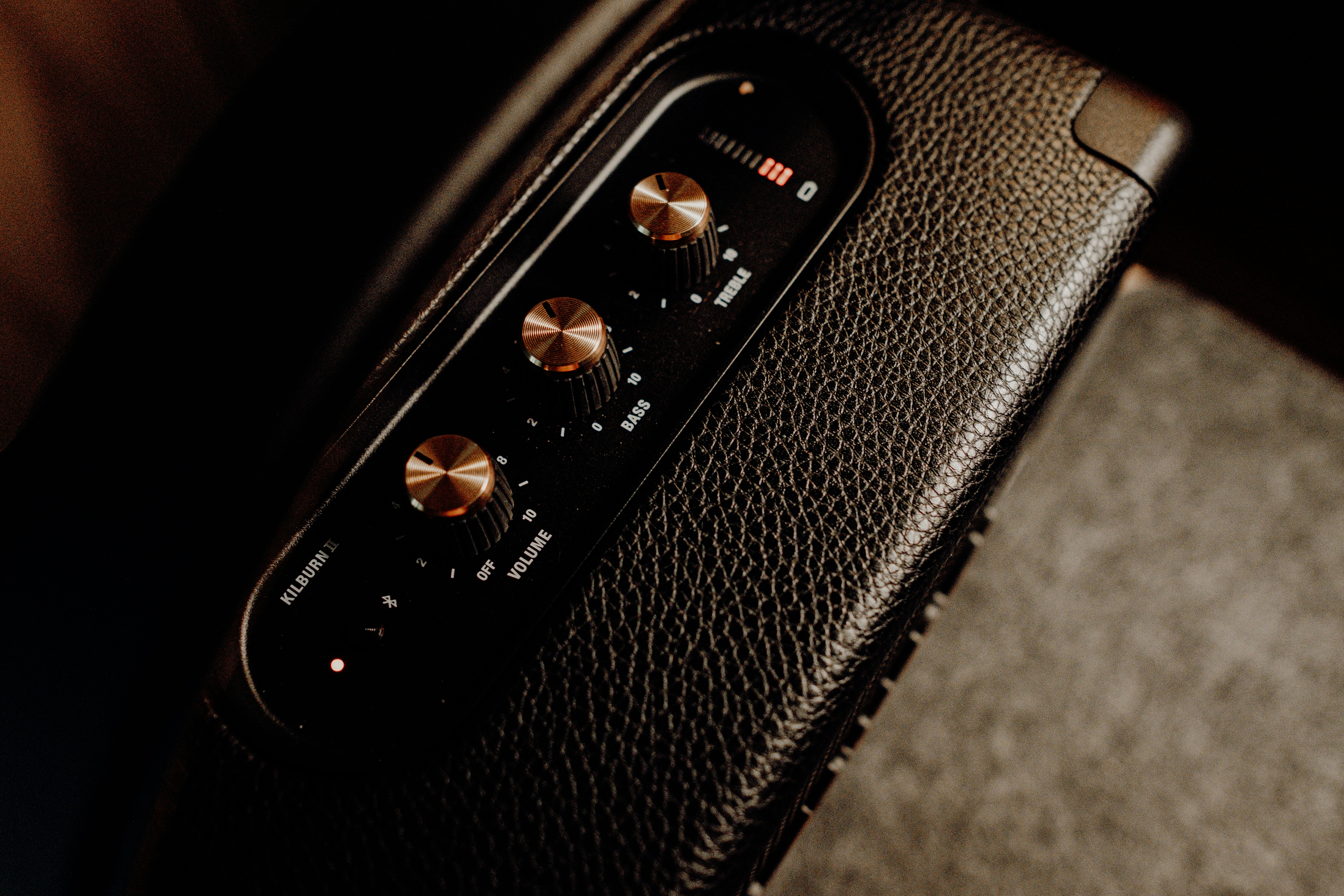 A close up of a remote control in a car