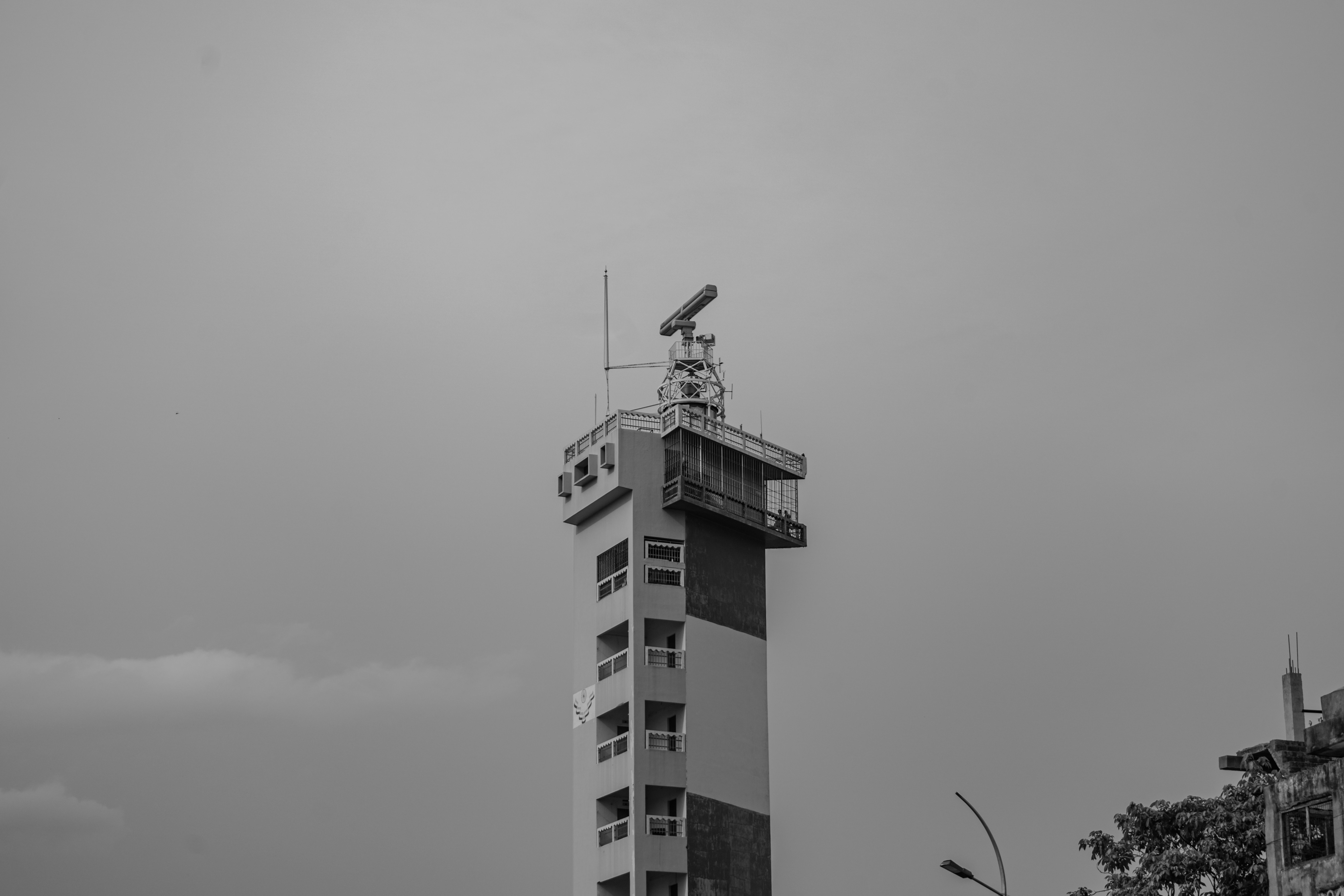 A black and white photo of a tall building