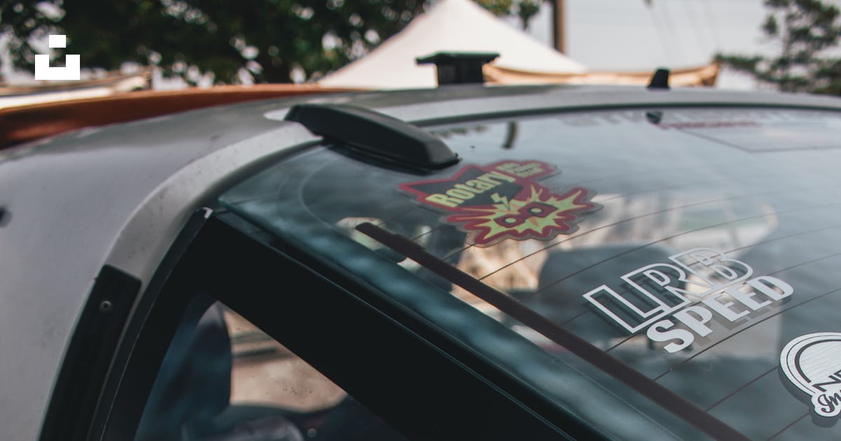 A close up of a car with stickers on it photo – Free Rotary engine ...