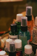 A bunch of bottles of different types and colors