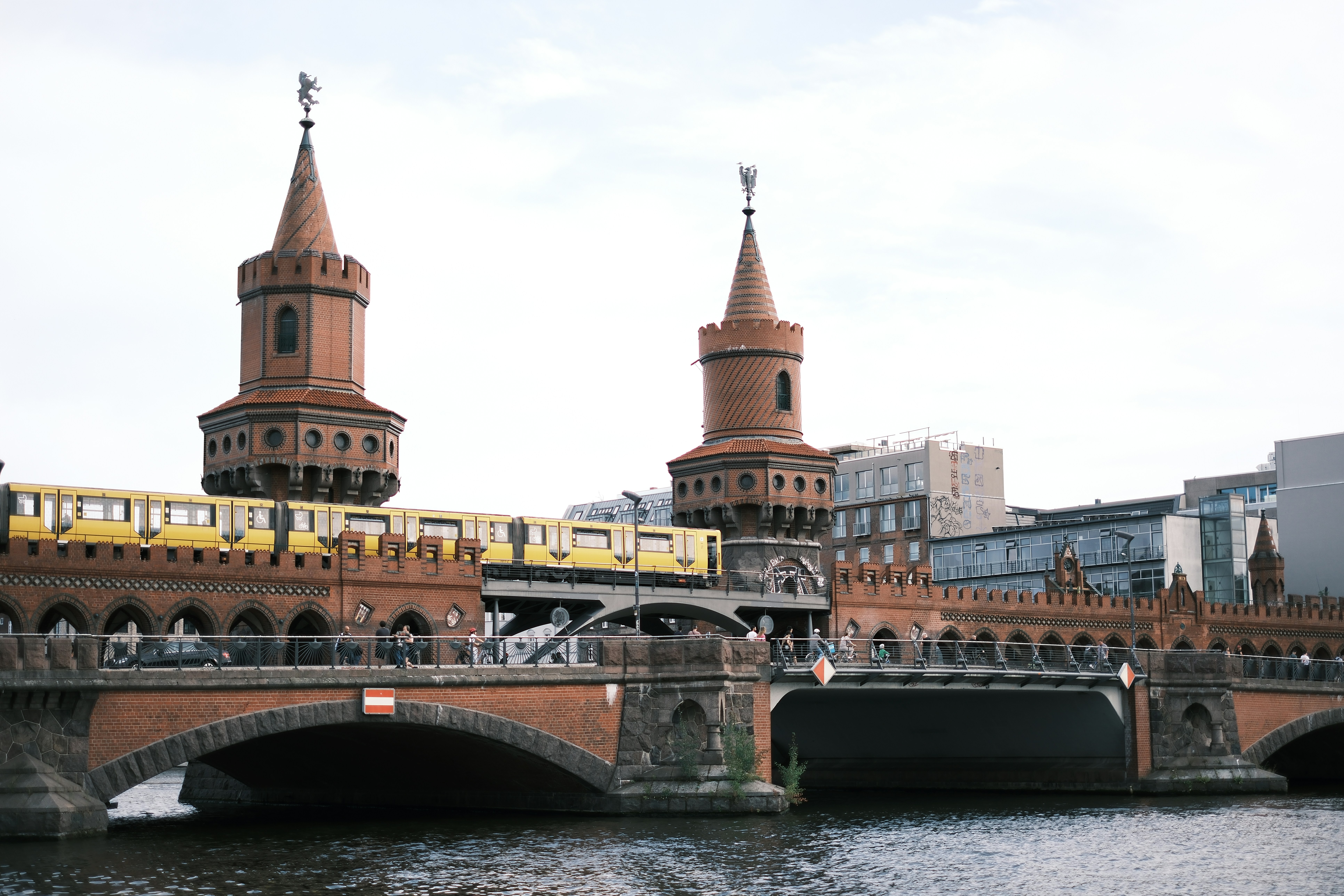 A bridge with a train going over it - a-bridge-with-a-train-going-over-it-kWo8jpq-Jsc