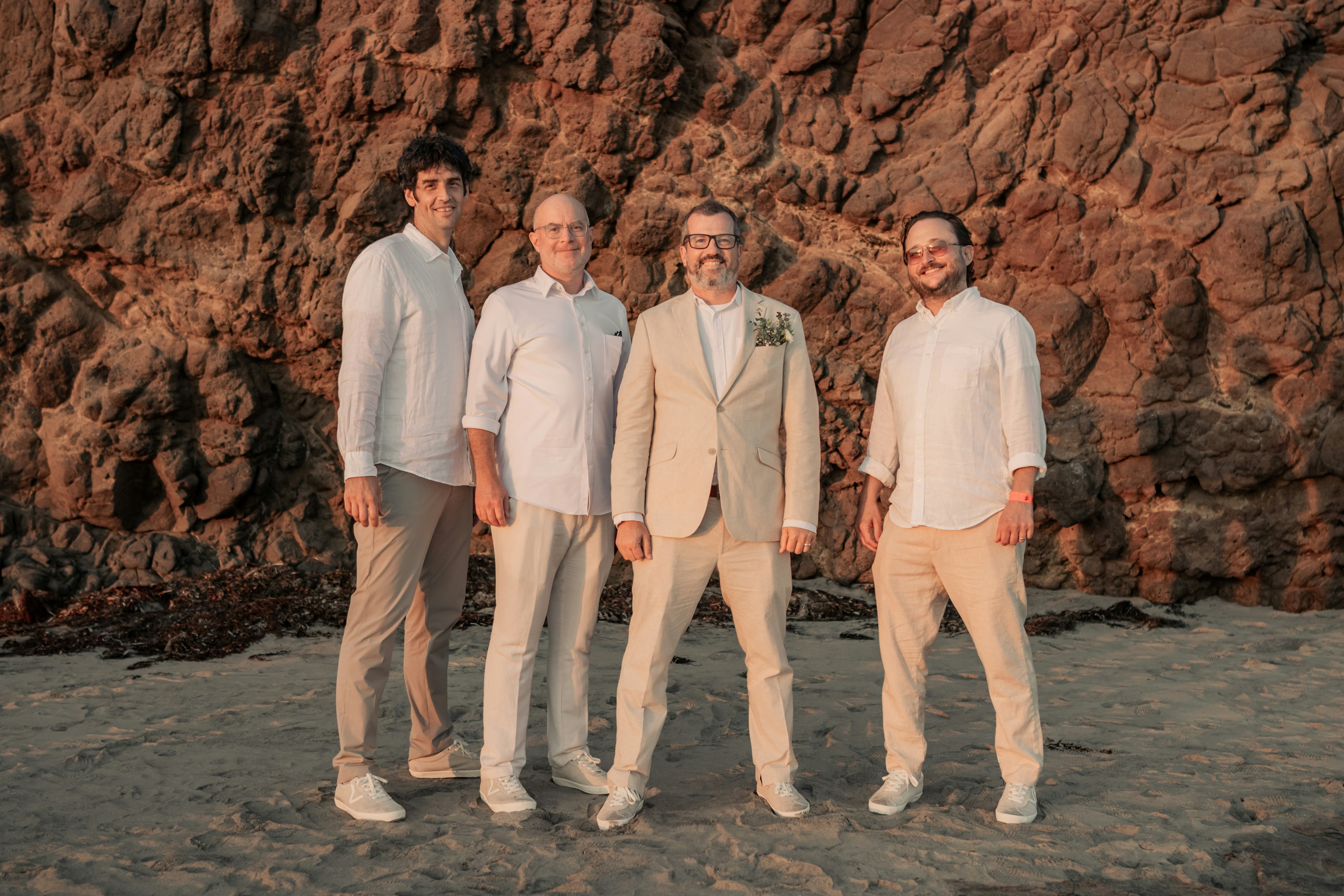 A group of men standing next to each other