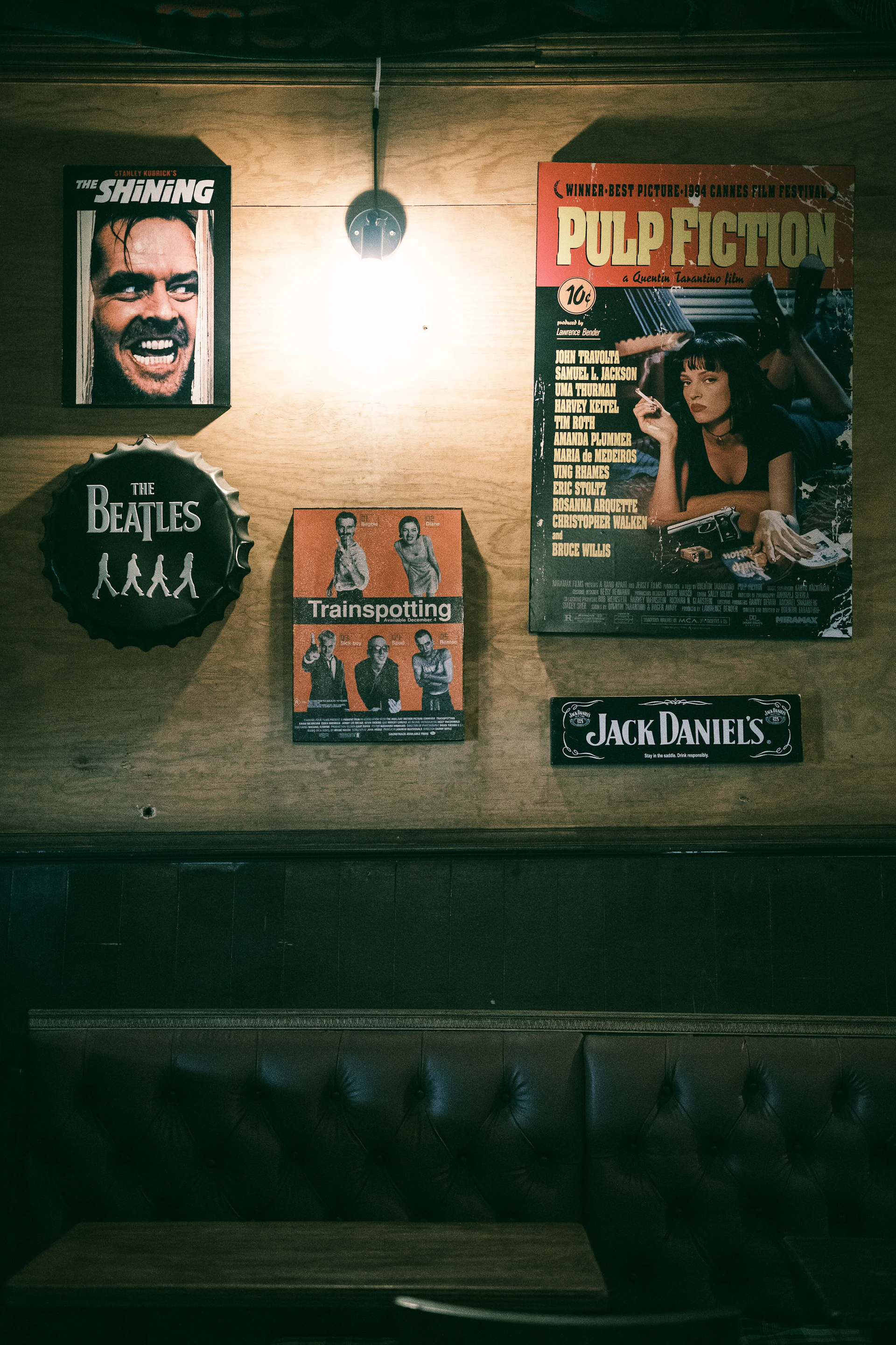 A wall with a bunch of posters on it