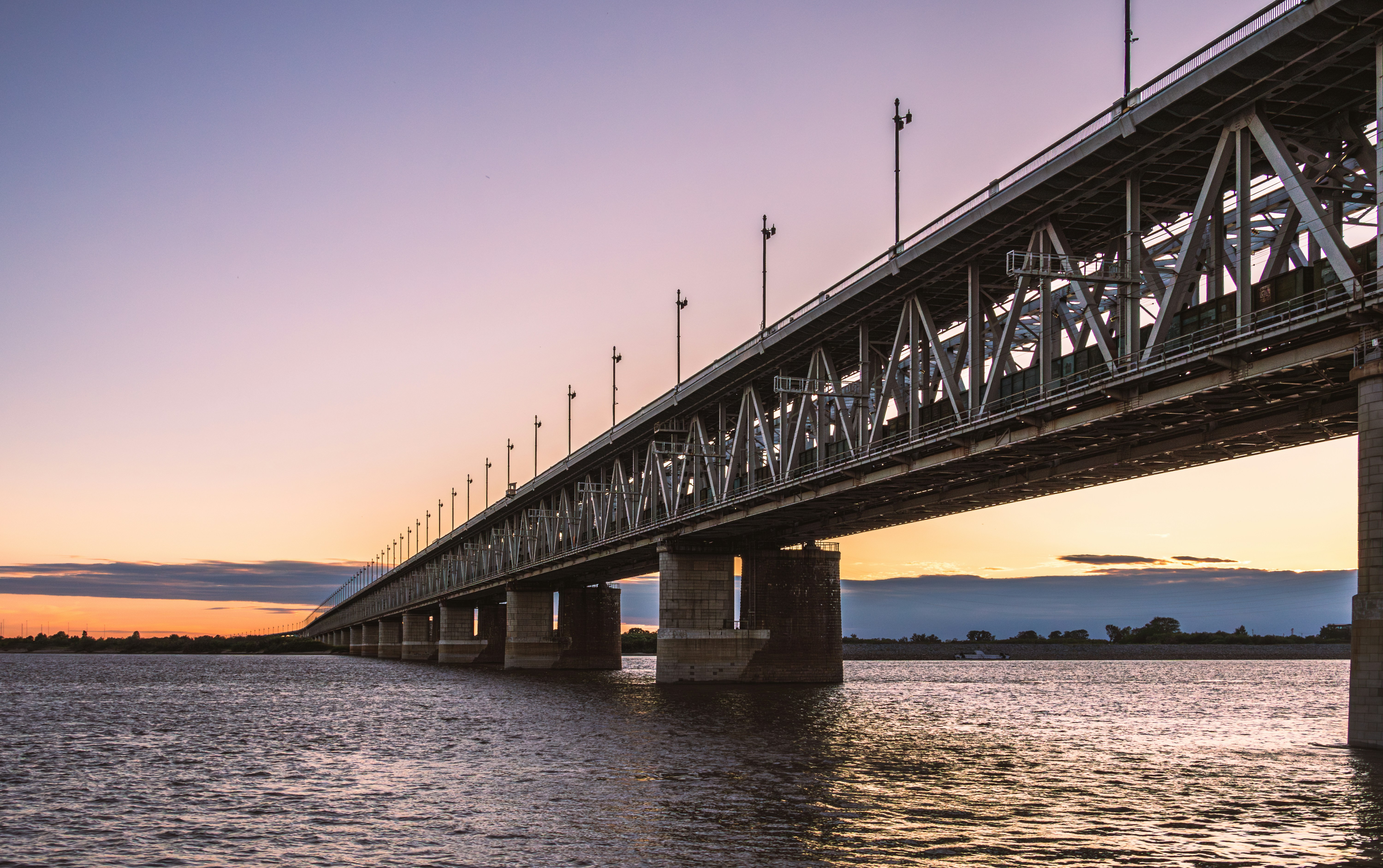 A large bridge spanning over a large body of water